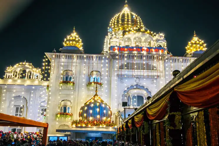 Sikh temple at night with lights on